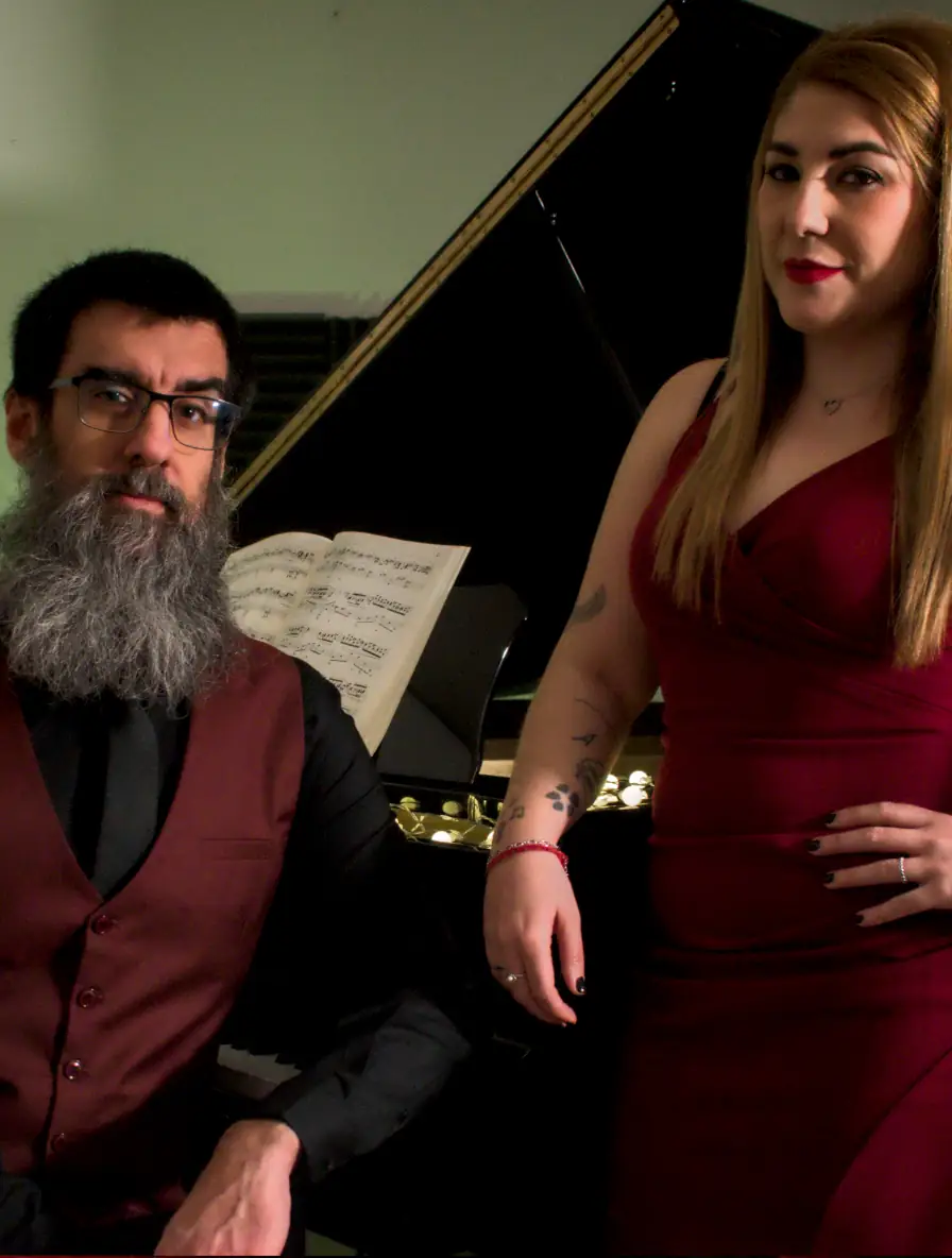 Red Vest al piano
